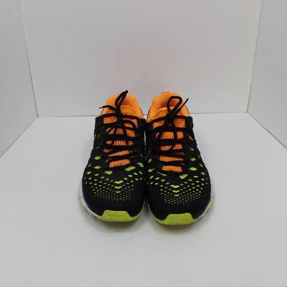 orange and green nike shoes